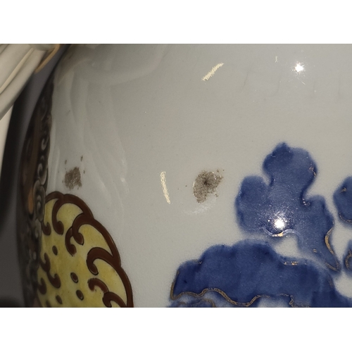 20 - A pair of antique Japanese porcelain decorative vases (possibly Karatsu). Have been more recently co... 