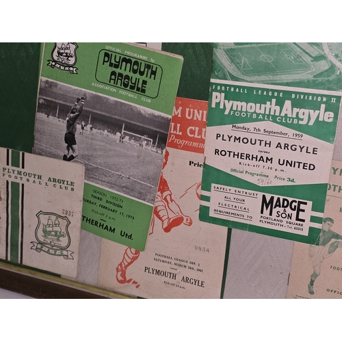 35 - Framed and glazed Plymouth Argyle FC display to include 1992-1994 shirt and matchday programmes dati... 