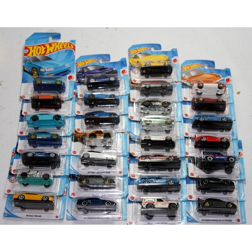 134 - A collection of contemporary  Matchbox Japanese HW-J Imports die-cast model vehicles. 29 in lot, all... 