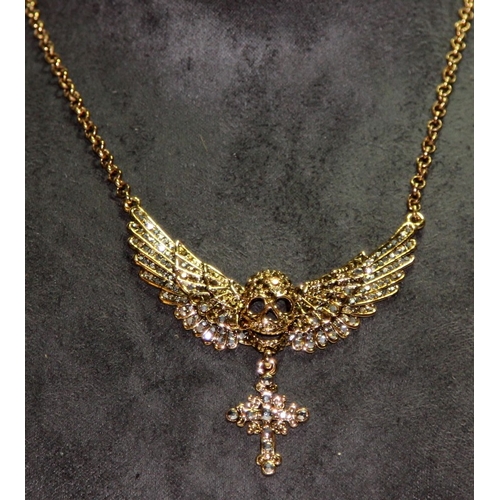 271A - Butler & Wilson designer costume jewellery. Jewelled winged skull necklace