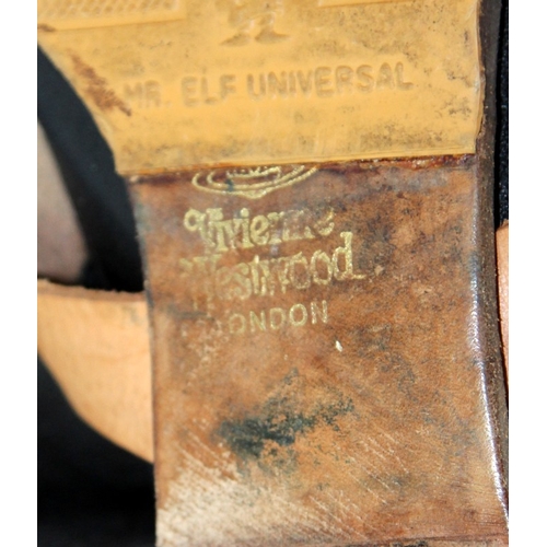 15A - Vivienne Westwood: A pair of pirate buckle calf length boots approx size 5.5/6. Re-soled. From a sin... 