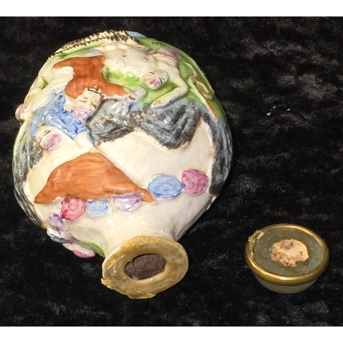 283 - Antique 19th Century Qing Dynasty Chinese Famille Rose moulded porcelain snuff box. 8cm tall. Slight... 