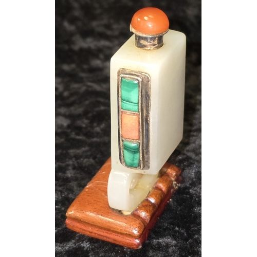 298 - Chinese pale celadon jade rectangular snuff bottle. On polished wooden base decorated with semi prec... 