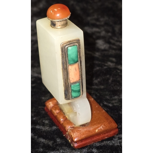 298 - Chinese pale celadon jade rectangular snuff bottle. On polished wooden base decorated with semi prec... 