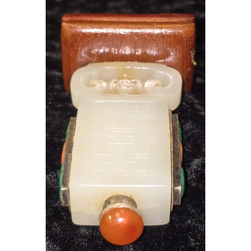 298 - Chinese pale celadon jade rectangular snuff bottle. On polished wooden base decorated with semi prec... 