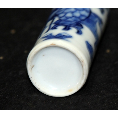 297 - Antique Oriental Snuff Bottle: Of cylindrical form with blue and white floral decoration. O/all 10cm... 