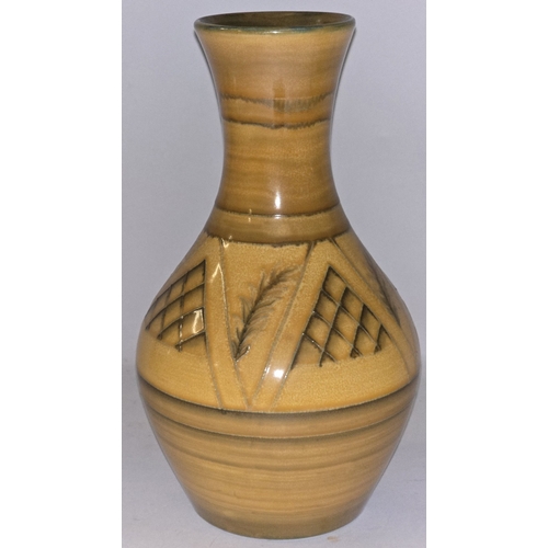 41 - An early Moorcroft Pottery baluster vase with flared rim. Unusual pattern possibly a trial piece. St... 