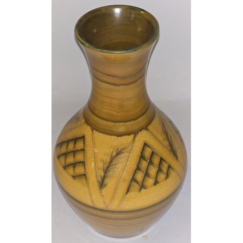 41 - An early Moorcroft Pottery baluster vase with flared rim. Unusual pattern possibly a trial piece. St... 