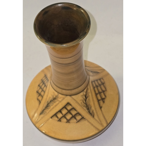 44 - An early Moorcroft Pottery bulbous low waisted vase with flared rim. Unusual pattern possibly a tria... 