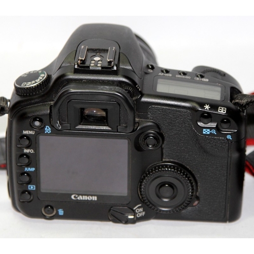 54 - Canon EOS 30D digital SLR camera with 18-55mm lens. With battery but no charger, untested.