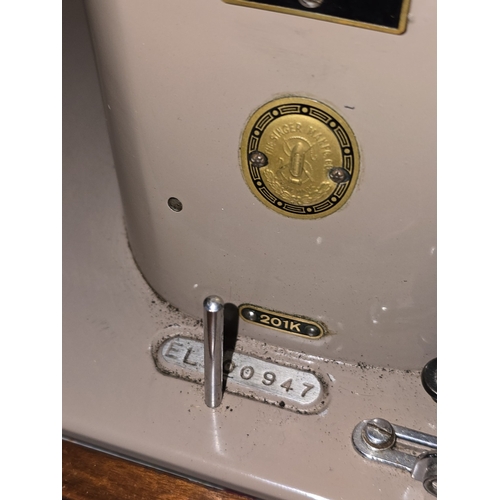 60 - A vintage Singer 201K electric sewing machine with foot pedal in original case.