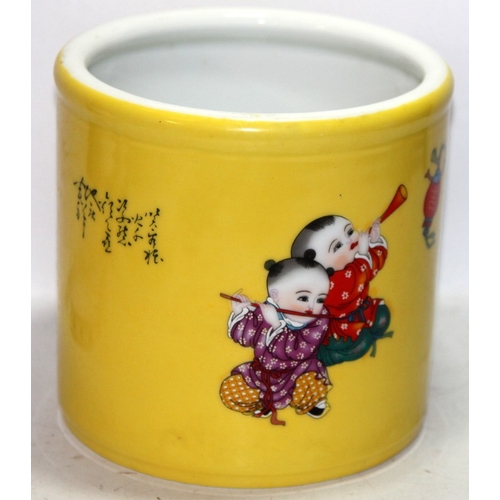9 - A large jardiniaire with images of Oriental children in traditional dress on a yellow ground. Chines... 