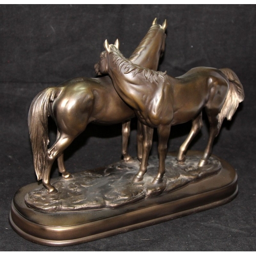 12 - Bronzed resin sculpture in the manner of L'Accolade (The Embrace) by Pierre-Jules Mene. 30cms across