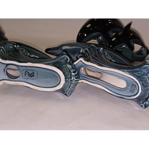 22 - Poole Pottery collection of blue glazed dolphins to include a double dolphin (5).