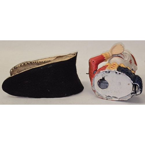 23 - A taxidermy study of an alligator head together with a contemporary cast metal money box.