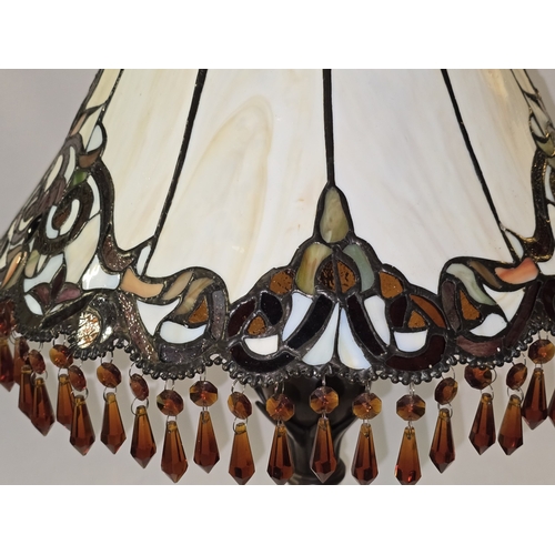 35 - A contemporary tiffany style table lamp with shade. 71cm tall.