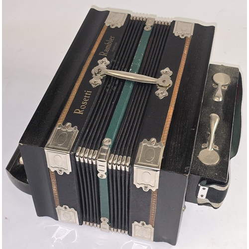 36 - A vintage Rosetti Rambler accordion c/w accordion book. Appears in exceptional condition for age.