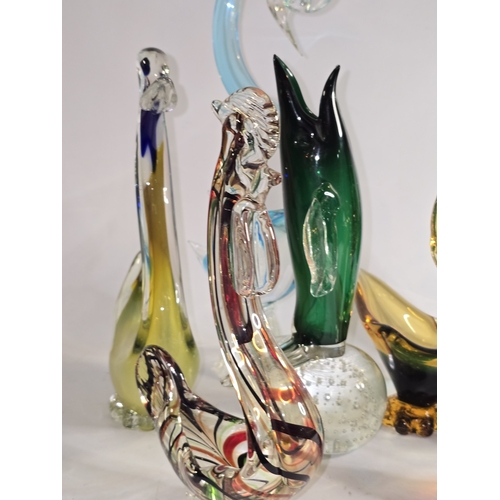 50 - A good collection of coloured Murano glassware animals (damage to red duck). Nine pieces in all.