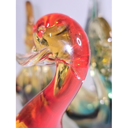 50 - A good collection of coloured Murano glassware animals (damage to red duck). Nine pieces in all.