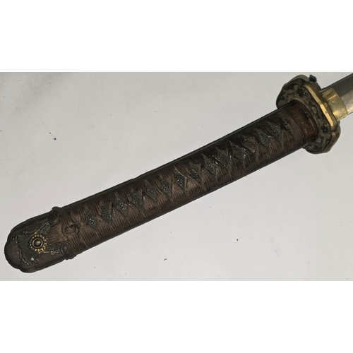 56 - A Japanese Shin Gunto imperial officers sword. Markings on tang identified as 