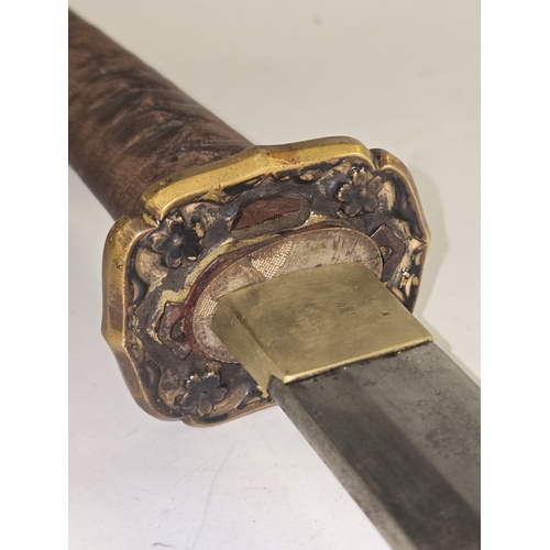 56 - A Japanese Shin Gunto imperial officers sword. Markings on tang identified as 