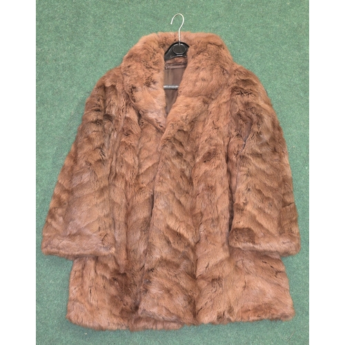 57 - A vintage ladies real brown mink fur coat. No makers labels.