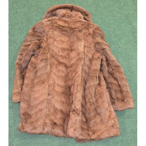 57 - A vintage ladies real brown mink fur coat. No makers labels.