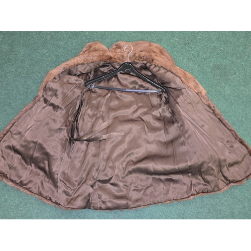 57 - A vintage ladies real brown mink fur coat. No makers labels.