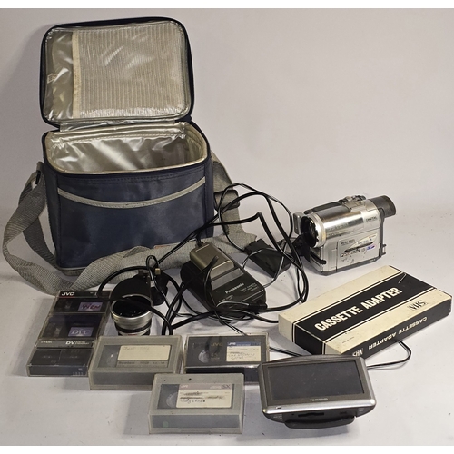 55 - Panasonic NV-GX7 Handheld MiniDV Cassette Camcorder together with charger and two batteries. Powers ... 