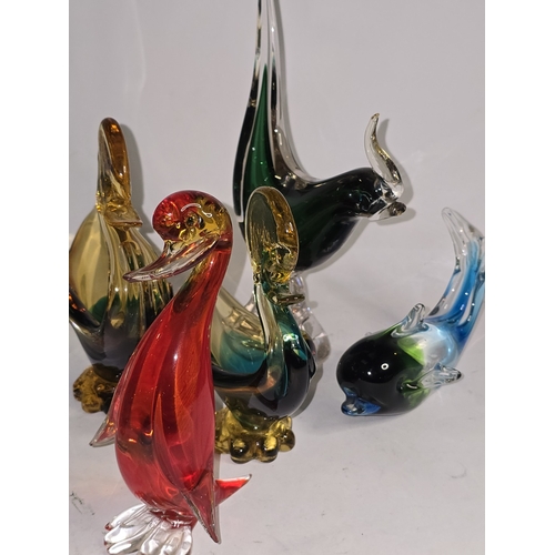 23 - A good collection of coloured Murano glassware animals (damage to red duck). Nine pieces in all.