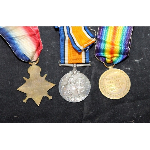 61 - WWI medal trio to include 1914-15 Star. Private, Gloucestershire Regiment, low service number 12678.