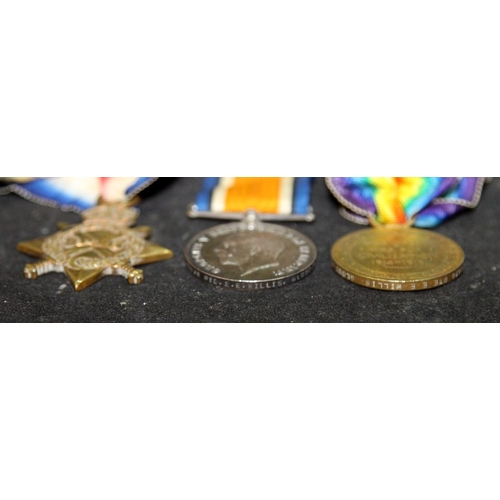 61 - WWI medal trio to include 1914-15 Star. Private, Gloucestershire Regiment, low service number 12678.