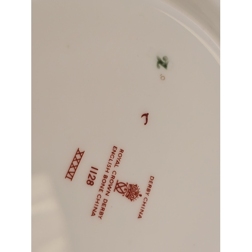 221 - Royal Crown Derby: A pair of 1128 Old Imari pattern coffee can trios to include cup, saucer and side... 