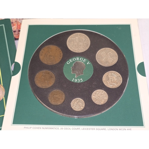 296 - Collection of crowns and year coin sets in presentation wallets.