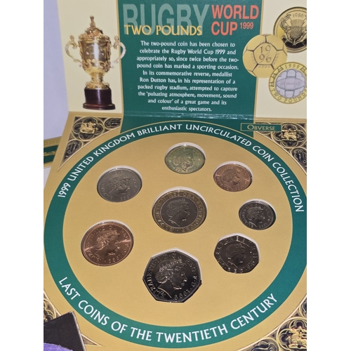 296 - Collection of crowns and year coin sets in presentation wallets.
