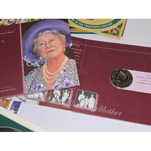 296 - Collection of crowns and year coin sets in presentation wallets.