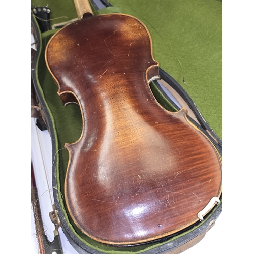 45 - Antique single piece back violin in original case with bow. Sold for restoration.