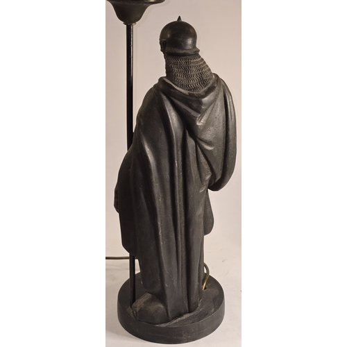 8 - A vintage spelter French figural table lamp of Clovis, King of Franks on base with flame style glass... 