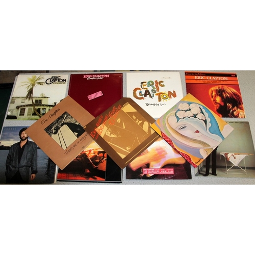 217 - Eric Clapton: A collection of original vinyl LP's including 461 Ocean Boulevard, August, Behind the ... 