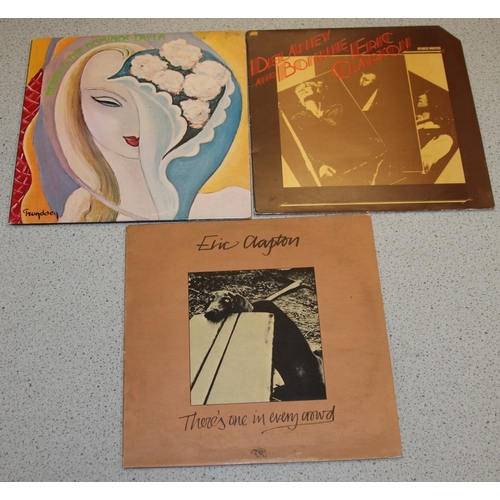 217 - Eric Clapton: A collection of original vinyl LP's including 461 Ocean Boulevard, August, Behind the ... 