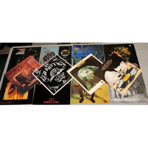 218 - American blues/prog/rock. A collection of vinyl LP's to include Pete Seeger, Pavlov's Dog, Moby Grap... 