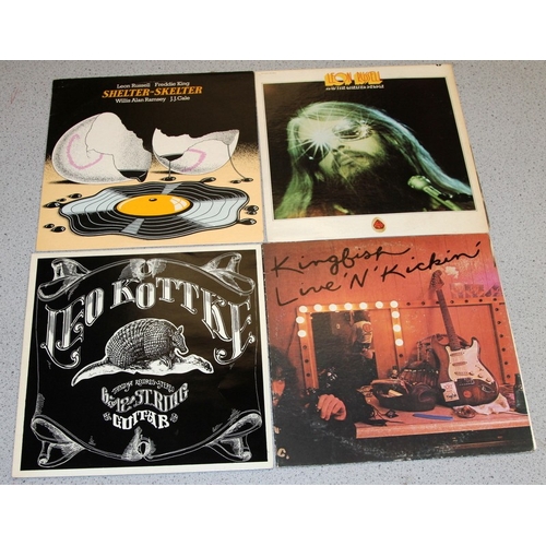 218 - American blues/prog/rock. A collection of vinyl LP's to include Pete Seeger, Pavlov's Dog, Moby Grap... 
