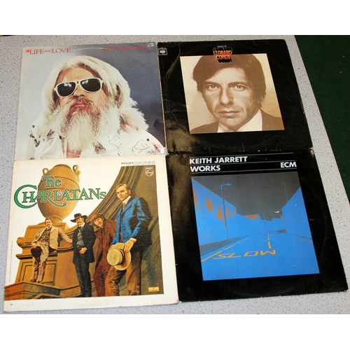 223 - American blues/prog/rock. A collection of vinyl LP's to include Leonard Cohen, Leon Russell, Kingfis... 