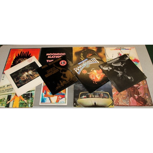 231 - A collection of American blues/prog/rock vinyl LP's to include The Band, Leo Kottke, Santana, Paul K... 