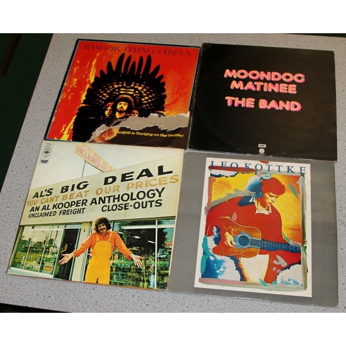 231 - A collection of American blues/prog/rock vinyl LP's to include The Band, Leo Kottke, Santana, Paul K... 