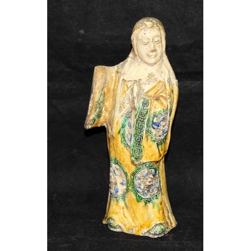 12 - Antique southern Chinese Qing dynasty slip cast and glazed figure of a dancer with repairs. 18cms ta... 