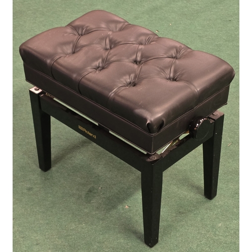 61 - A Roland branded adjustable piano stool.