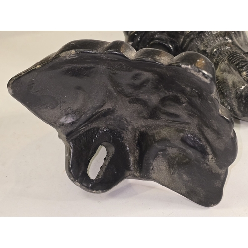62 - A set of four vintage cast metal ball and claw feet originally belonging to a bathtub. Each 19cm tal... 