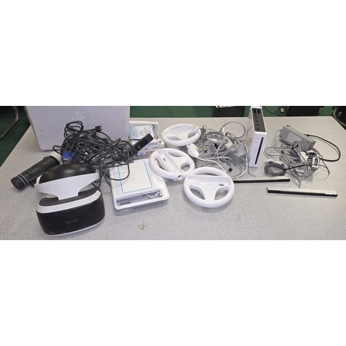 63 - Mixed gaming items to include Nintendo Wii console, PlayStation VR headset, controllers, games etc.
