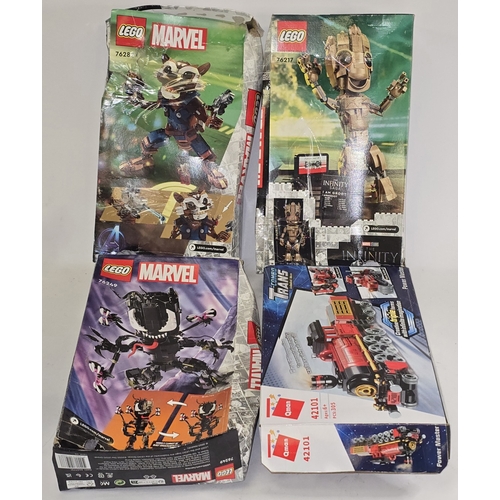 56 - A collection of boxed building kits to include three Lego Marvel examples. Not checked for completen... 